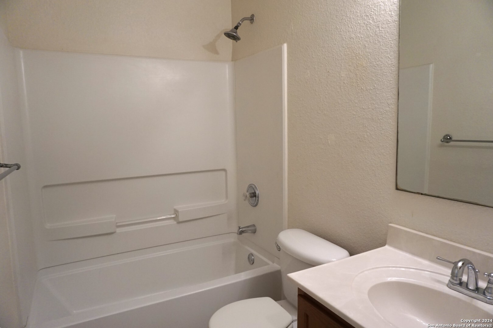 7730 Ruidoso Chase Selma, TX 78154 - Photo 16 of 22 a bathroom with a sink toilet and shower