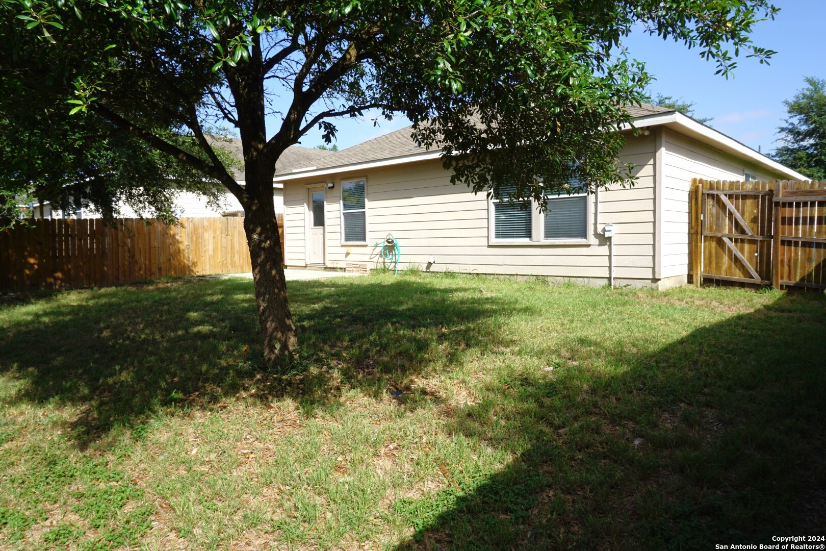 7730 Ruidoso Chase Selma, TX 78154 - Photo 21 of 22 a view of a house with a yard