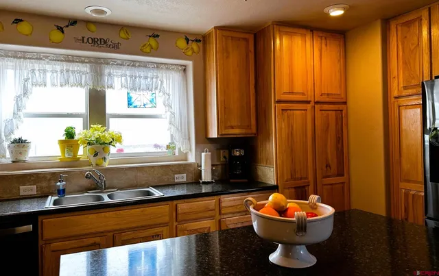 a bedroom with a bed and a chair