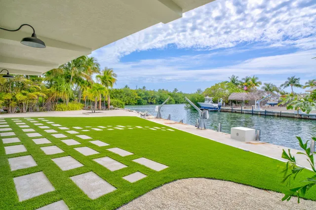a view of a porch with wooden floor and outdoor space