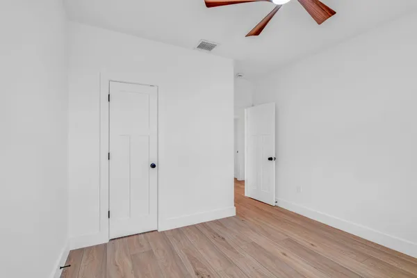 a bathroom with a shower and a toilet