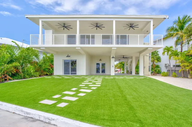 a view of an empty room and a window