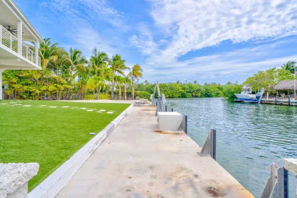 a view of a lake with a garden
