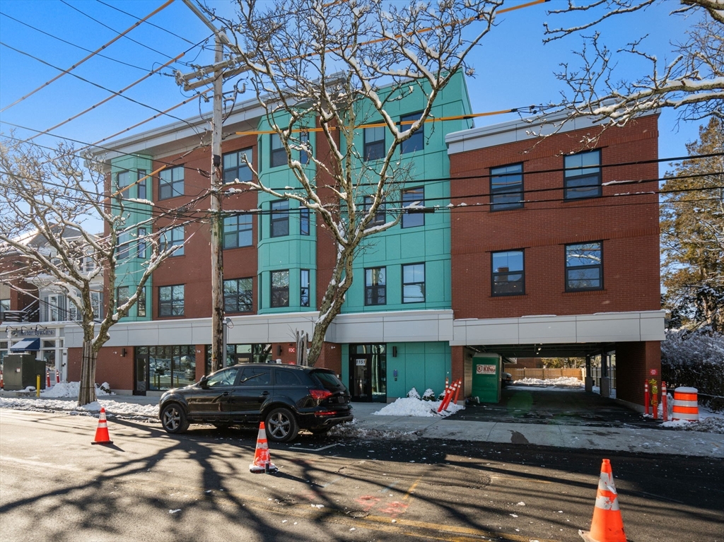 1151 Walnut Street, Unit 307 Newton, MA 02461 - Photo 26 of 32 a car parked in front of a building