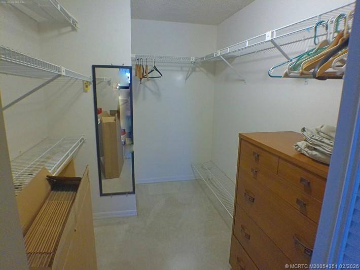 330 Southwest South River Drive, Unit 201 Stuart, FL 34997 - Photo 13 of 37 a view of walk in closet