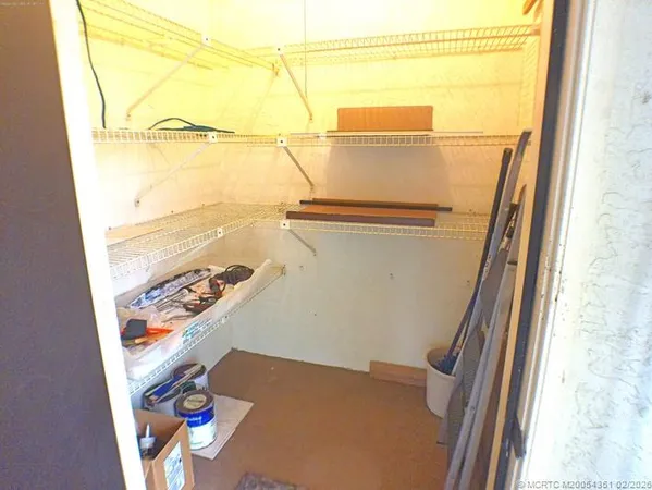 a view of a backyard with sitting area