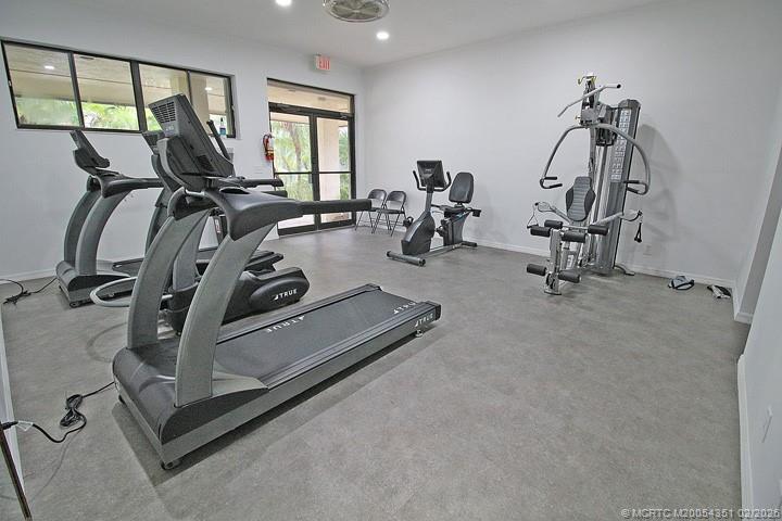 330 Southwest South River Drive, Unit 201 Stuart, FL 34997 - Photo 25 of 37 a view of a room with gym equipment