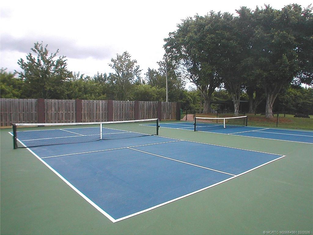 330 Southwest South River Drive, Unit 201 Stuart, FL 34997 - Photo 33 of 37 a view of a tennis court