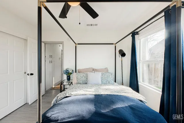 a kitchen with stainless steel appliances granite countertop a refrigerator sink and stove