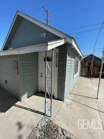 a bathroom with a double vanity sink mirror and toilet