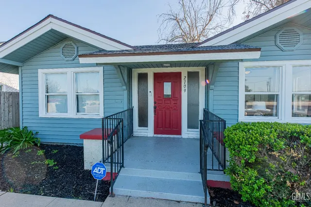 a front view of a house with a porch
