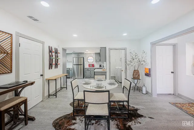 a view of a dining room with furniture