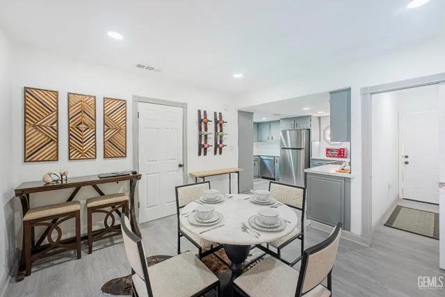 a view of a dining room with furniture