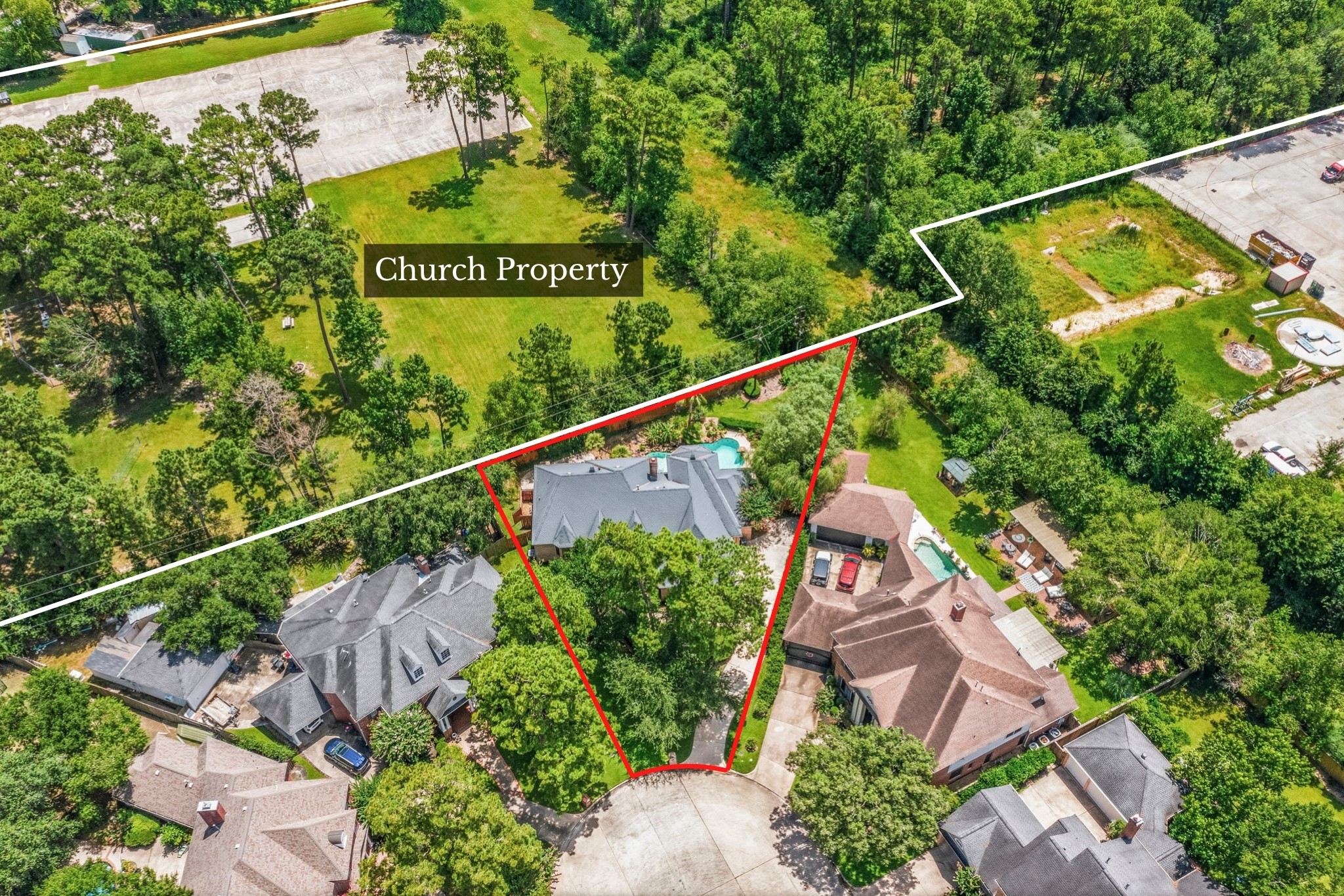 18503 Cabaniss Circle Spring, TX 77379 - Photo 2 of 49 One of this home's most desirable features is what lies beyond the backyard, a church-owned open space and mature woods provide exceptional privacy with no rear neighbors.