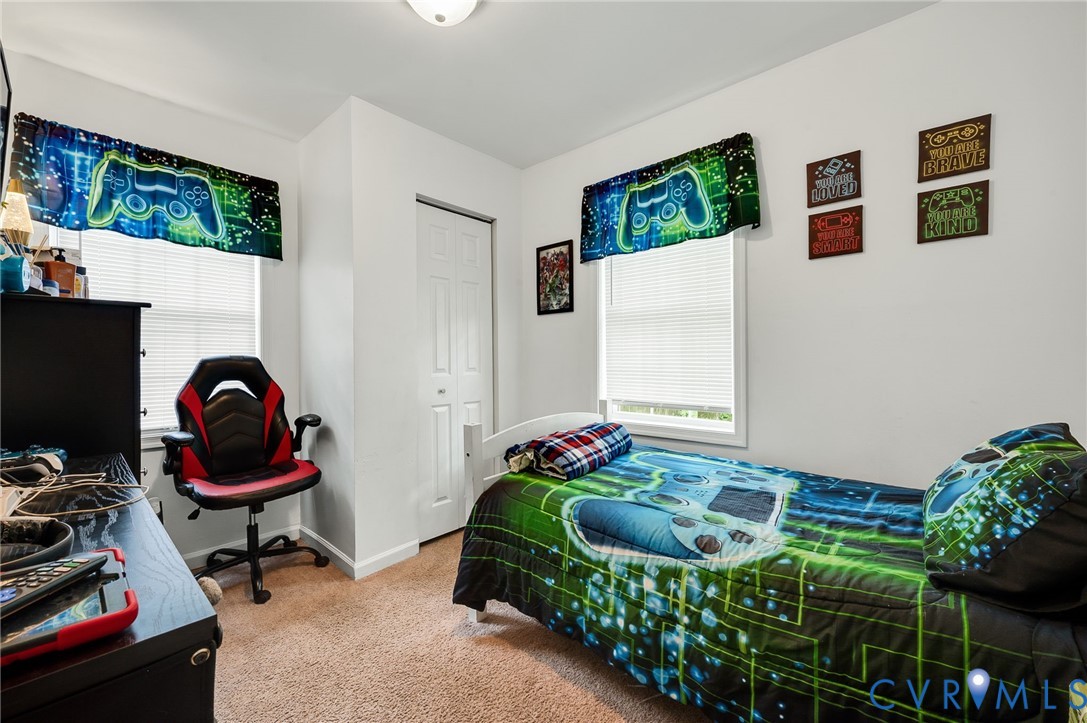 2909 Springview Drive Richmond, VA 23234 - Photo 16 of 19 a bedroom with bed and a window