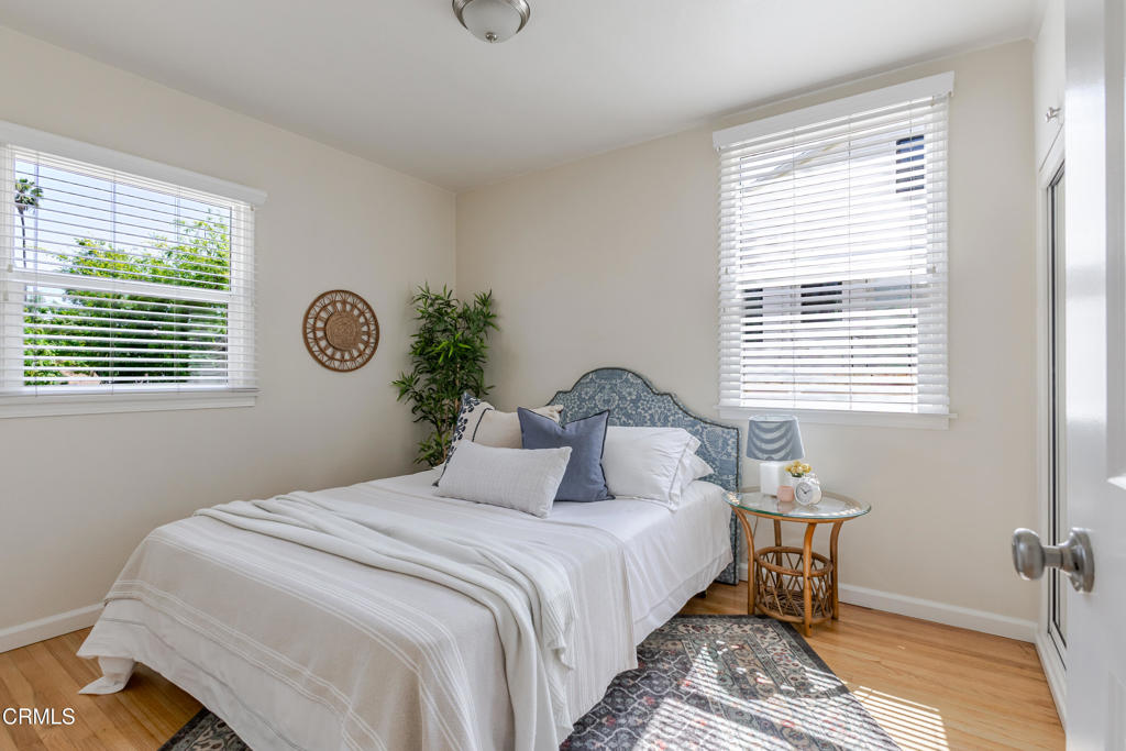 1500 East Topeka Street Pasadena, CA 91104 - Photo 14 of 20 a bedroom with a bed and a window