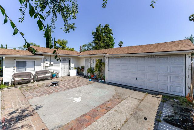 a view of a house with a patio