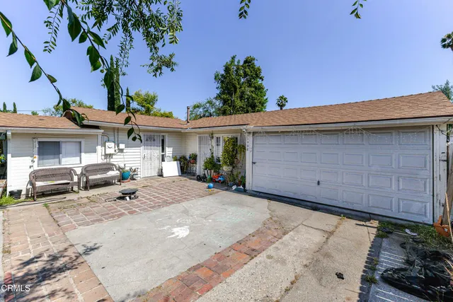 a view of a house with a patio