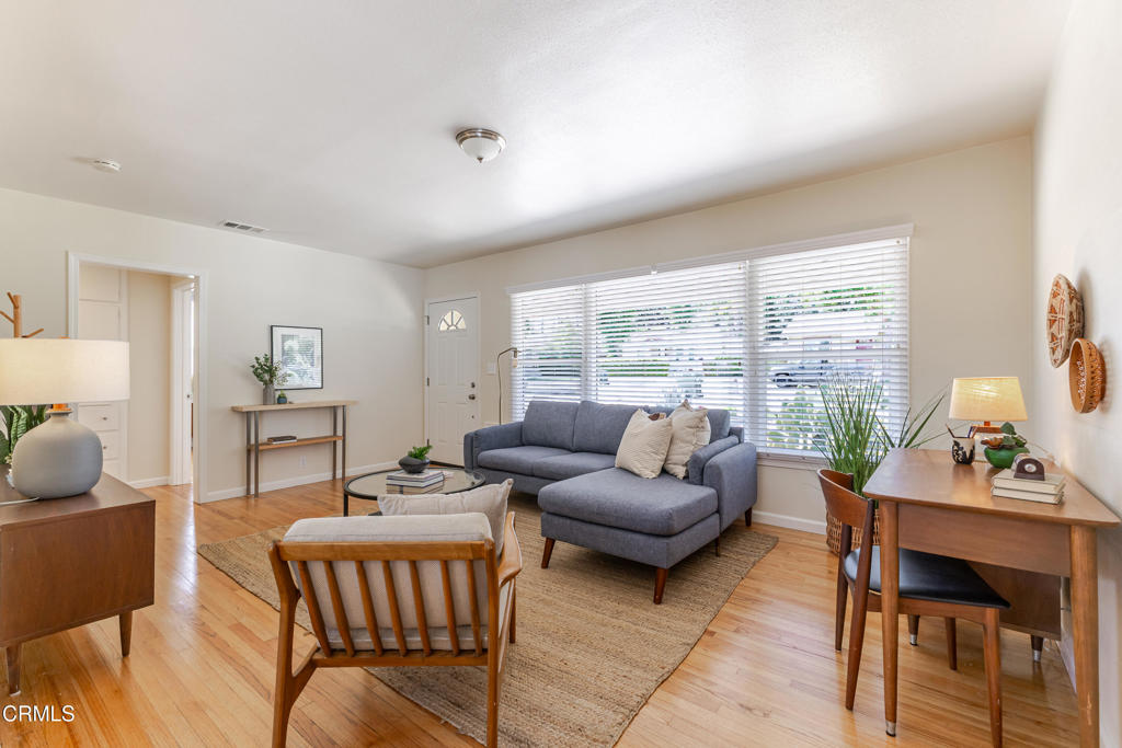 1500 East Topeka Street Pasadena, CA 91104 - Photo 5 of 20 a living room with furniture and a large window