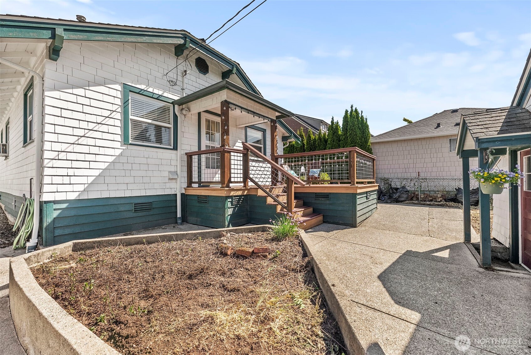 2121 5th Street Bremerton, WA 98312 - Photo 21 of 32 a front view of a house with garden
