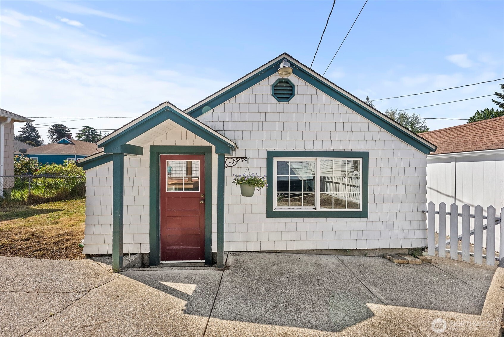 2121 5th Street Bremerton, WA 98312 - Photo 22 of 32 a front view of a house with a yard
