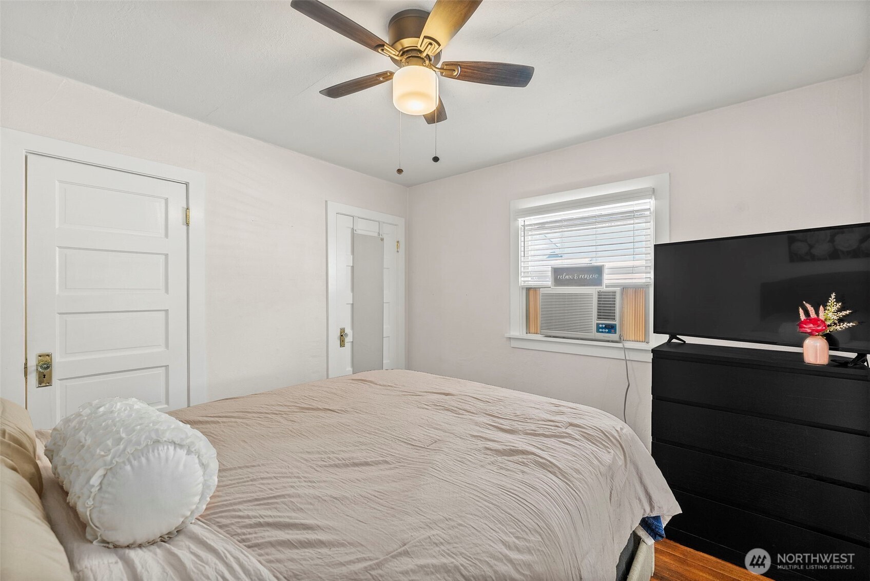 2121 5th Street Bremerton, WA 98312 - Photo 7 of 32 a bedroom with a bed and a flat screen tv