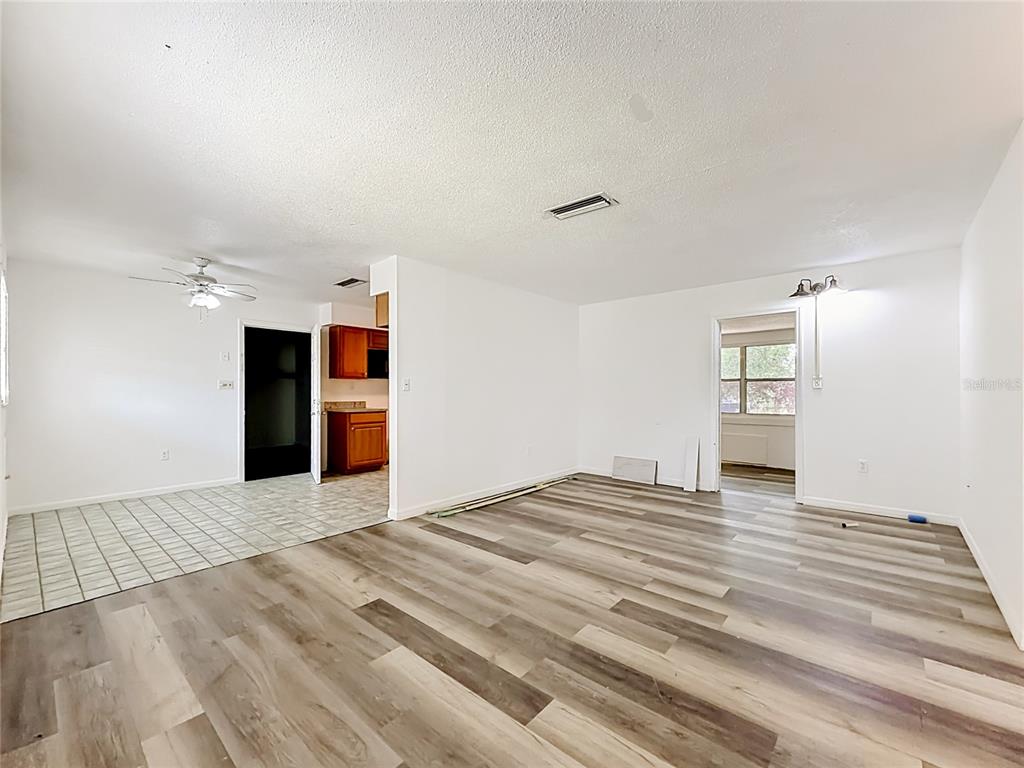 3 Bahia Pl Loop Ocala, FL 34472 - Photo 10 of 31 a view of empty room with wooden floor