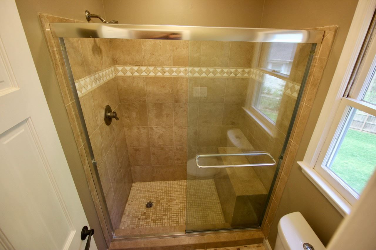7401 Rolling Dale Court Raleigh, NC 27615 - Photo 16 of 25 The best way to start your day is in this amazing, oversized shower that will have you thinking that you checked into Caesar's Palace. Enjoy the Beautiful Tiled Shower