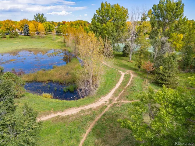 a view of a lake in middle of the town