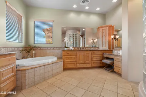 a bathroom with a sink a toilet and bathtub