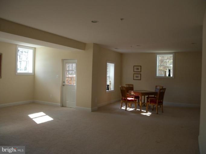 9907 Carter Road Bethesda, MD 20817 - Photo 14 of 30 high ceilings/door to back yard