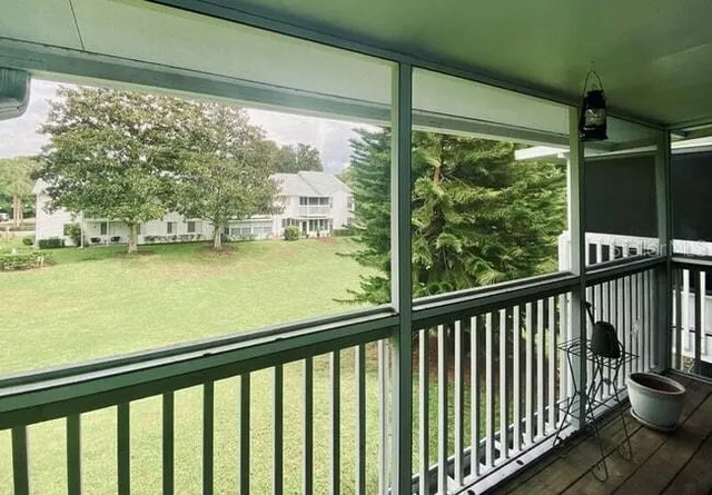 a view of a balcony with lake view