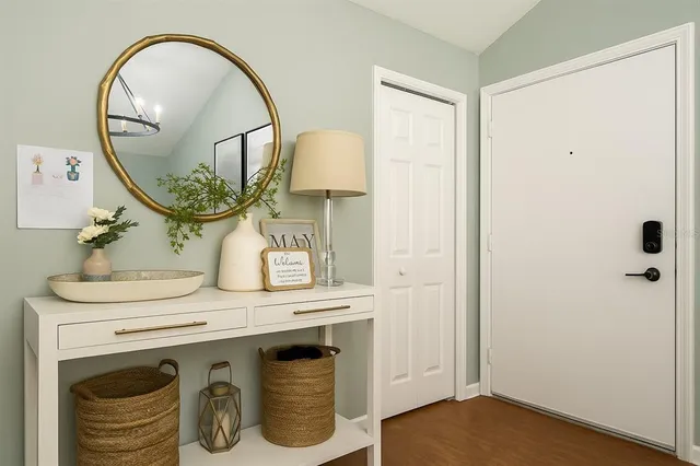 a bathroom with a sink a mirror and a shower