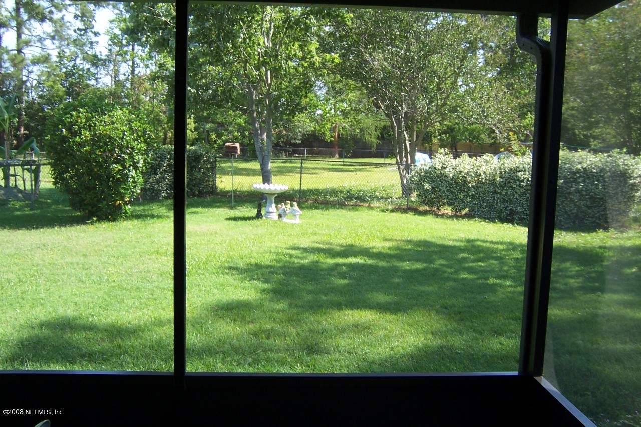 4637 Spring Park Road Jacksonville, FL 32207 - Photo 10 of 10 a view of a park with large trees