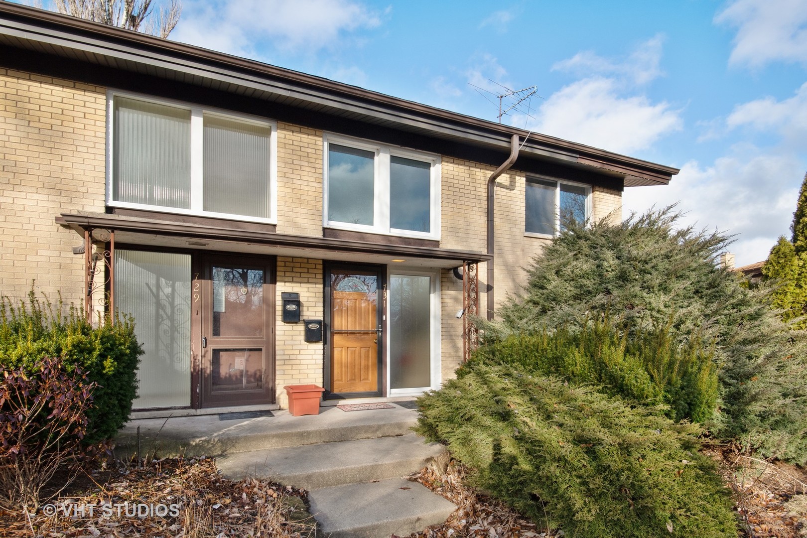 731 Hibbard Road Wilmette, IL 60091 - Photo 1 of 18 a house with trees in front of it