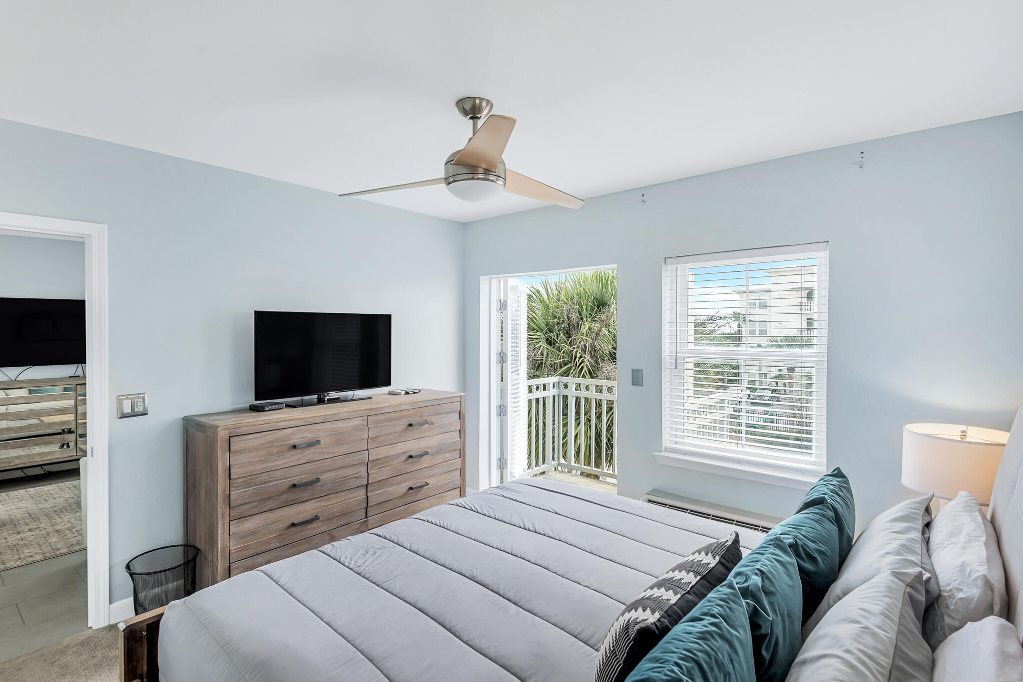 45 Town Center Loop, Unit 314 Santa Rosa Beach, FL 32459 - Photo 12 of 38 a bedroom with a bed and a flat screen television