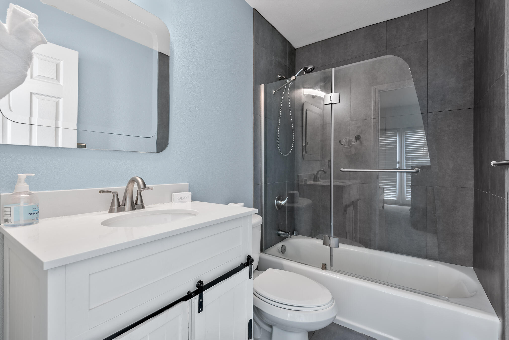 45 Town Center Loop, Unit 314 Santa Rosa Beach, FL 32459 - Photo 13 of 38 a bathroom with a sink toilet and shower