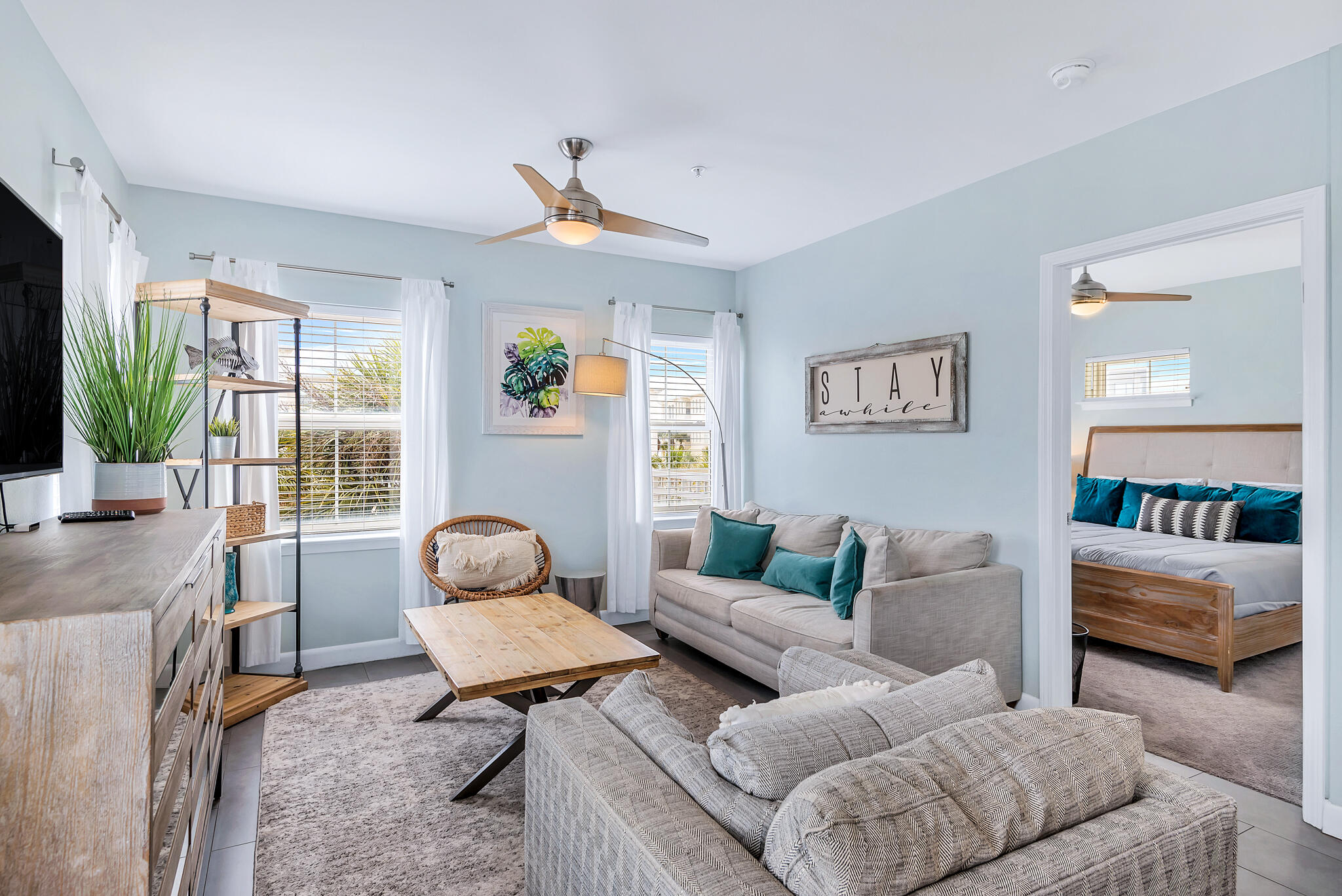 45 Town Center Loop, Unit 314 Santa Rosa Beach, FL 32459 - Photo 9 of 38 a living room with furniture and a window