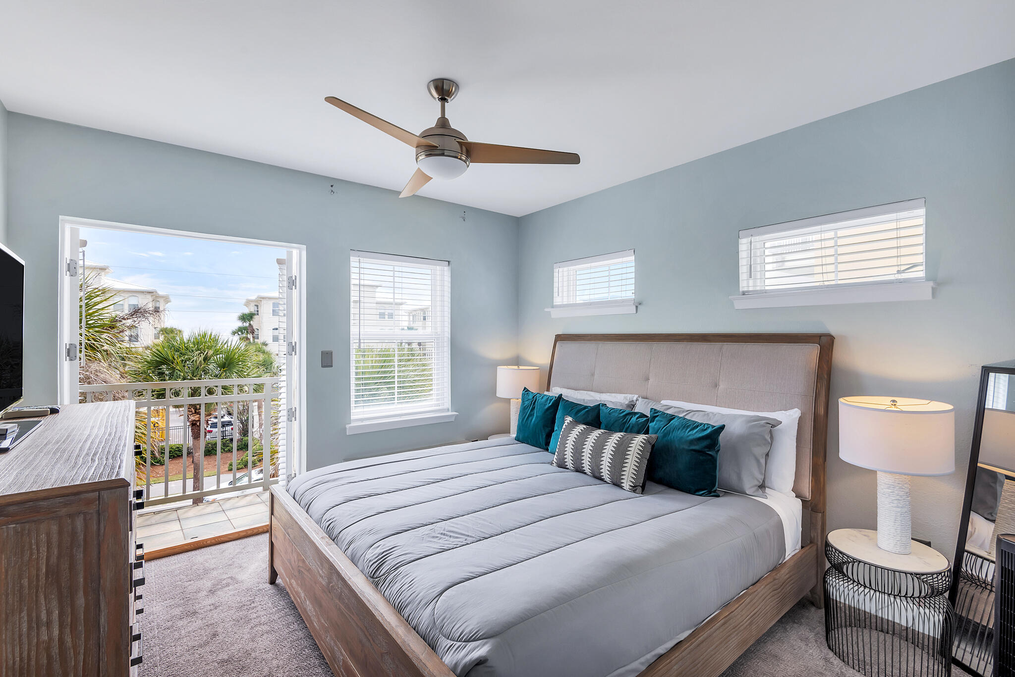 45 Town Center Loop, Unit 314 Santa Rosa Beach, FL 32459 - Photo 10 of 38 a bedroom with a large bed and a large window