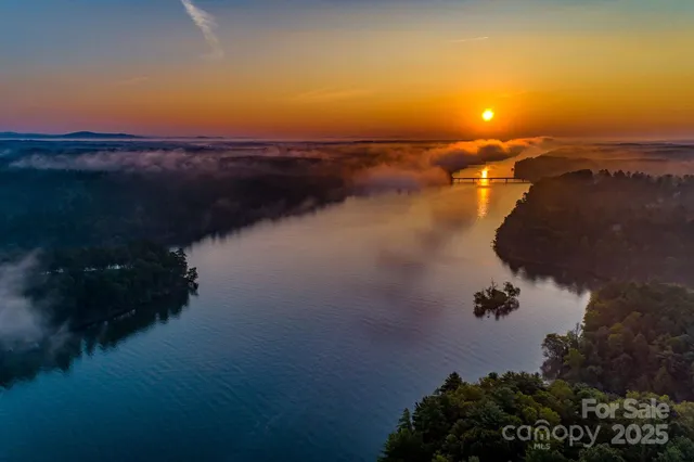 a view of lake and sunset