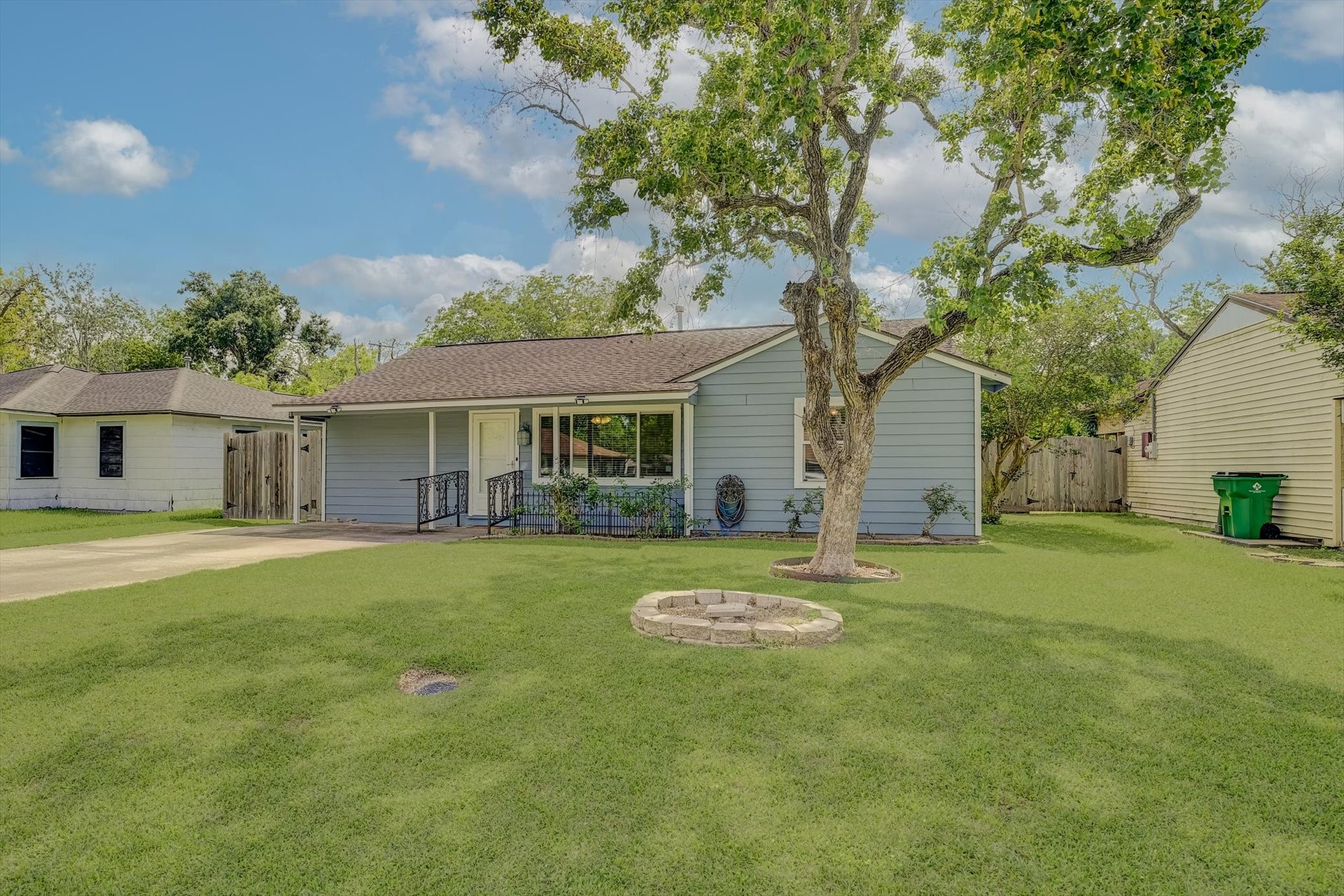 413 Farrer Street Angleton, TX 77515 - Photo 3 of 43 a view of a house with a yard and sitting area