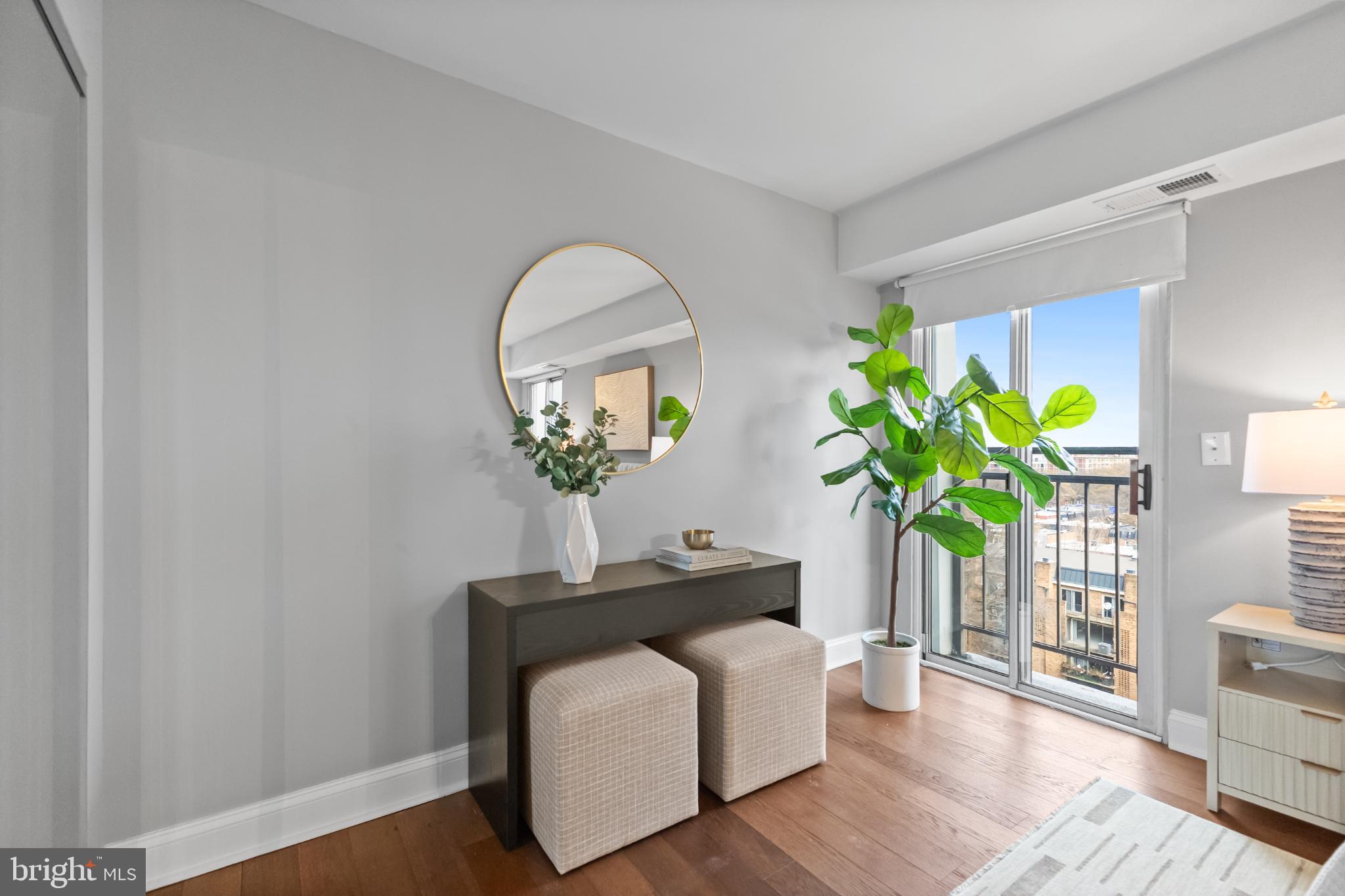 700 7th Street Southwest, Unit 813 Washington, DC 20024 - Photo 15 of 26 a view of living room with furniture and a potted plant