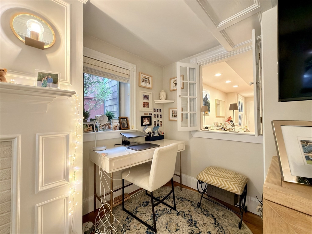 41 Pinckney Street, Unit B Boston, MA 02114 - Photo 23 of 31 a view of a dining room with furniture and a window