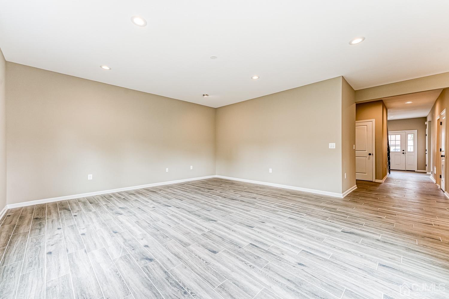 19 Crescent Road Edison, NJ 08817 - Photo 18 of 40 a view of an empty room with wooden floor and a window