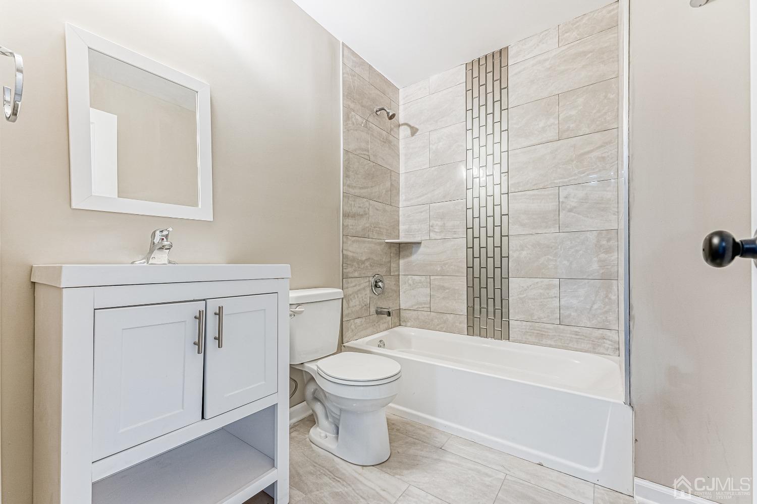 19 Crescent Road Edison, NJ 08817 - Photo 29 of 40 a bathroom with a sink toilet and shower