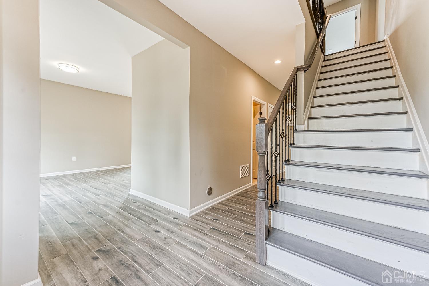 19 Crescent Road Edison, NJ 08817 - Photo 5 of 40 a view of entryway with wooden floor