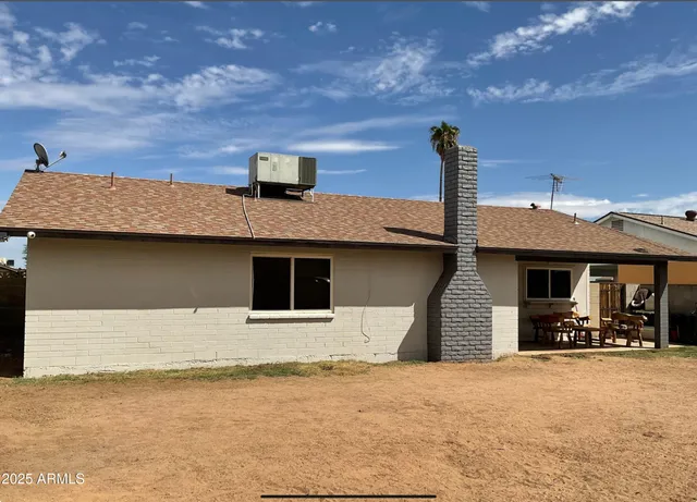 a front view of a house with yard