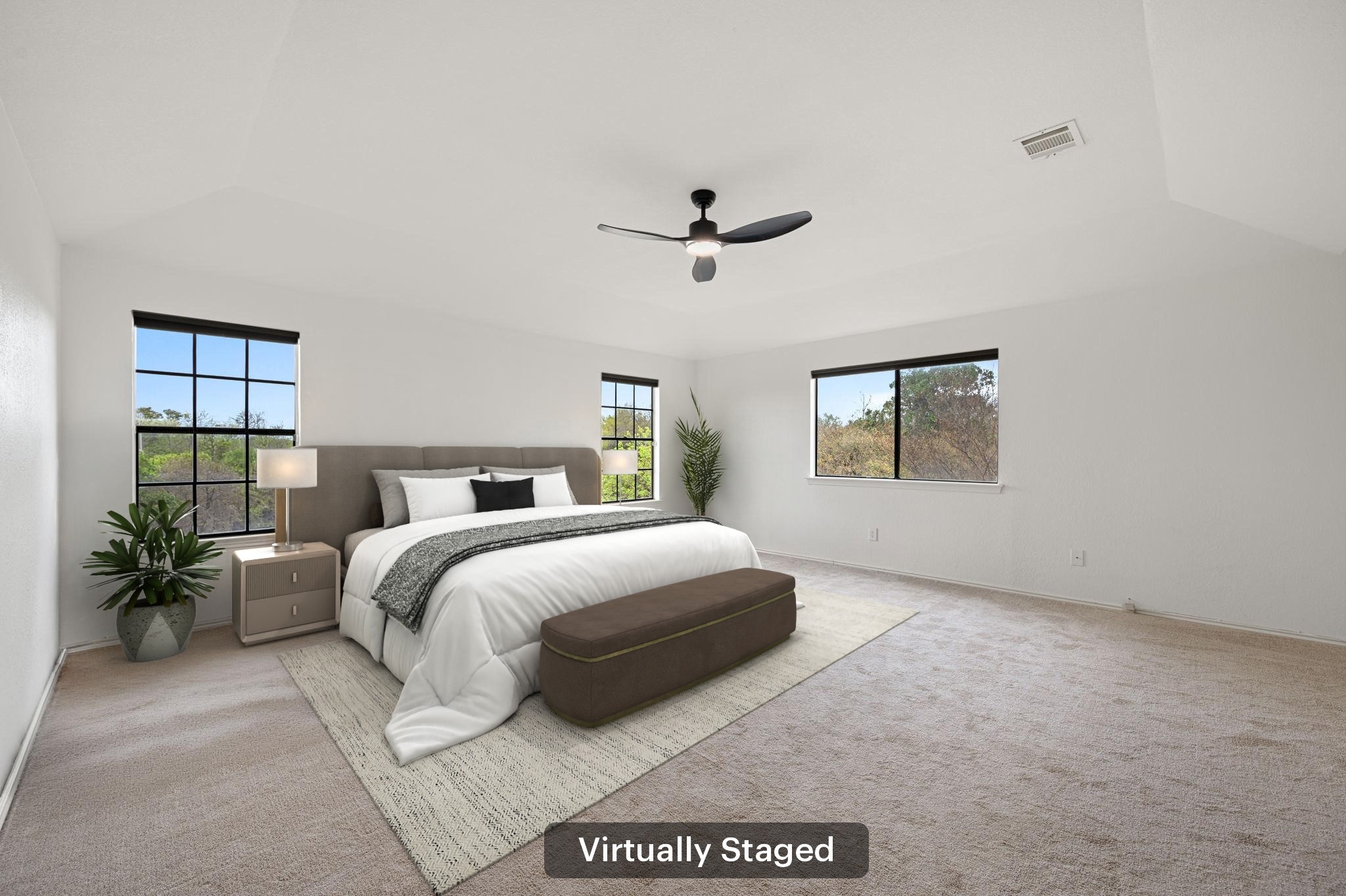 11942 Bittern Hollow Austin, TX 78758 - Photo 12 of 29 a bedroom with a large bed and a window