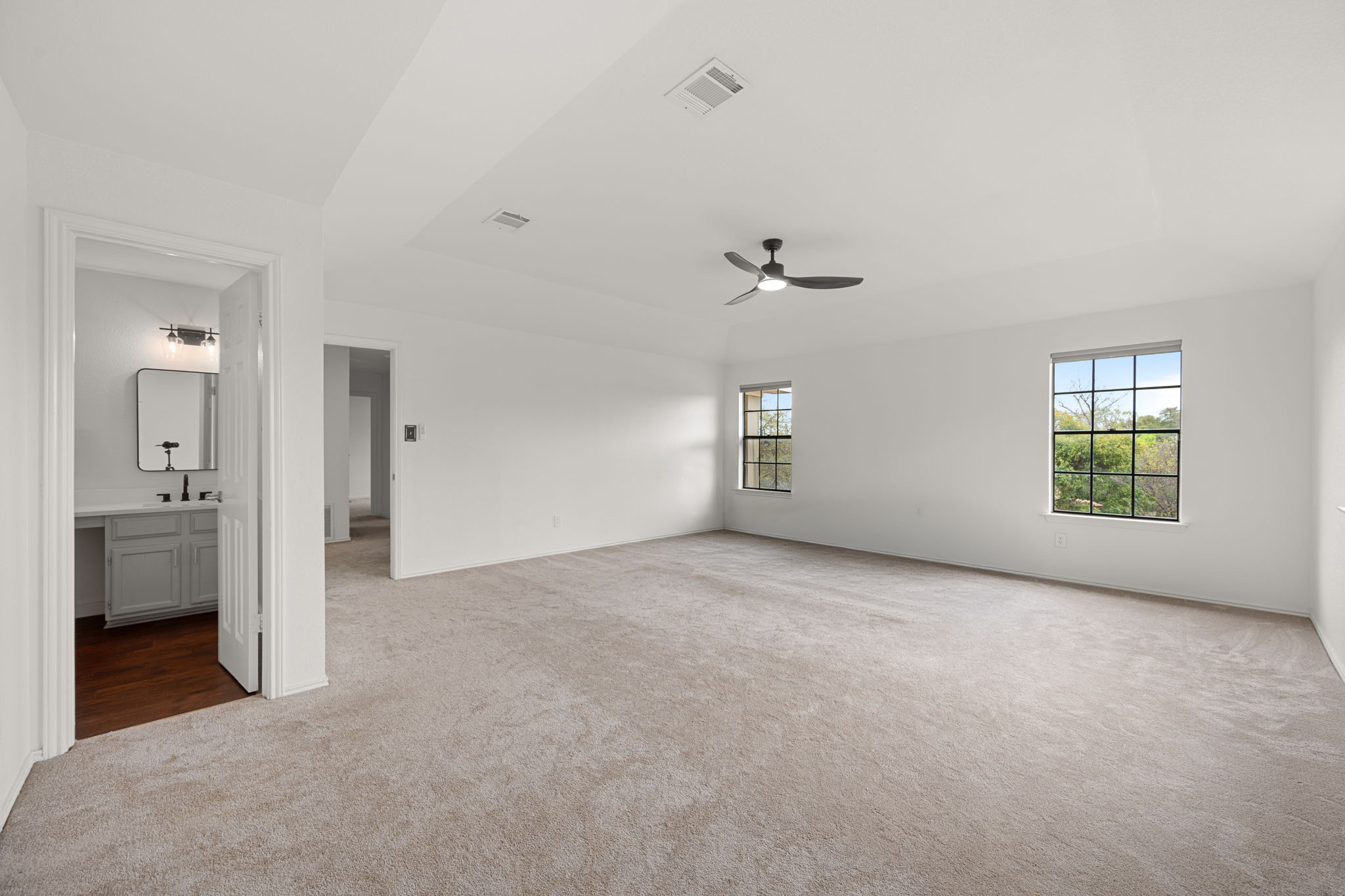 11942 Bittern Hollow Austin, TX 78758 - Photo 13 of 29 a view of an empty room with a window