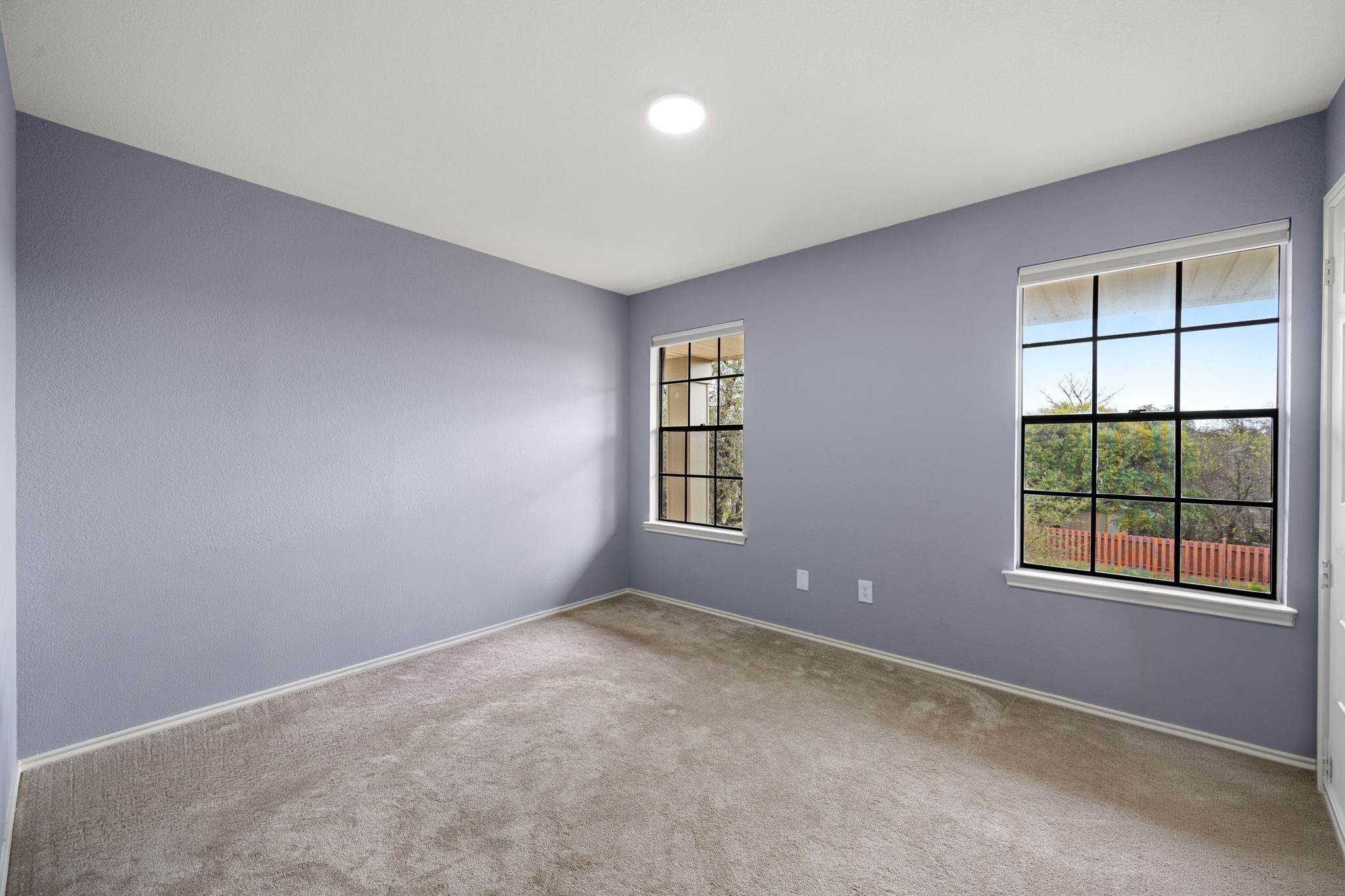 11942 Bittern Hollow Austin, TX 78758 - Photo 16 of 29 an empty room with windows